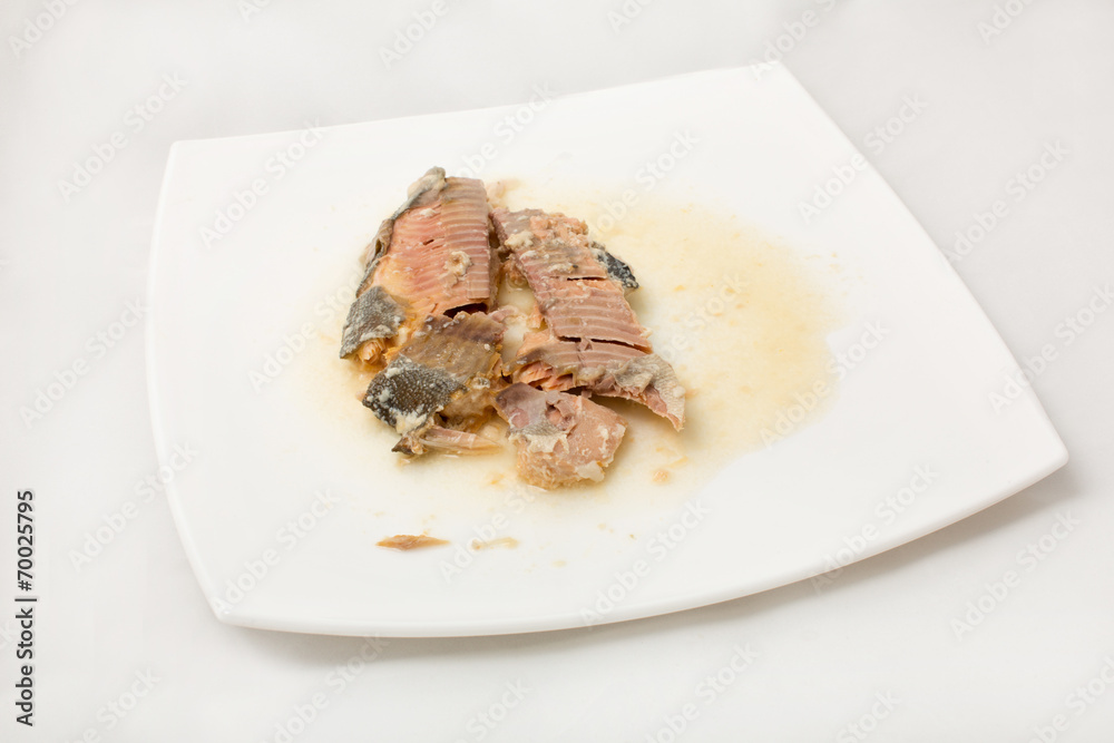 Sardines fish on dish on a white background