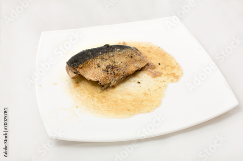 Sardines fish on dish on a white background