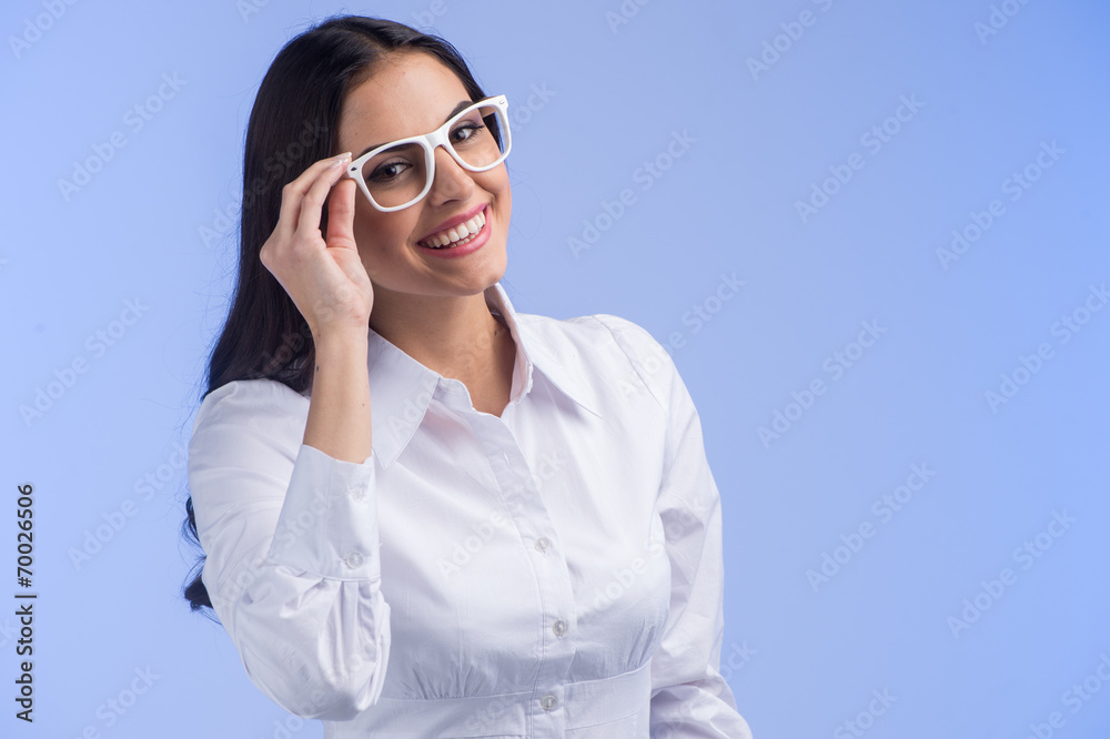 Portrait of beautiful happy young woman in glasses.