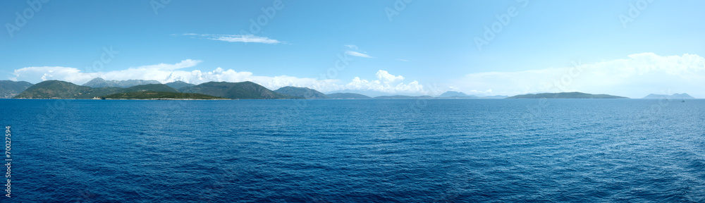 Sea summer coastline view from ferry (Greece). Panorama.