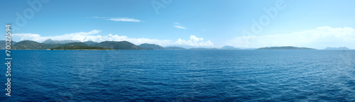 Sea summer coastline view from ferry (Greece). Panorama. © wildman