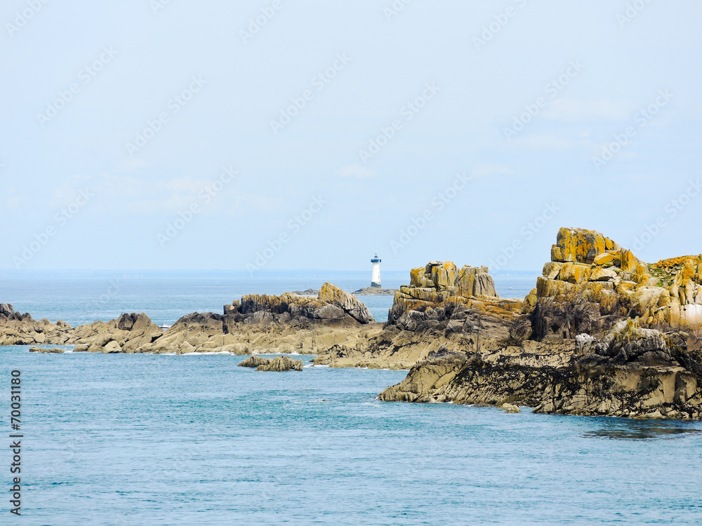 lighthouse near coastline English Channel Brittany