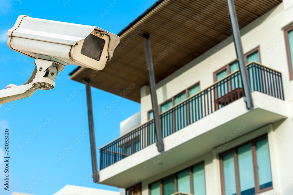 Obraz premium CCTV camera or surveillance operating with corridor apartment in