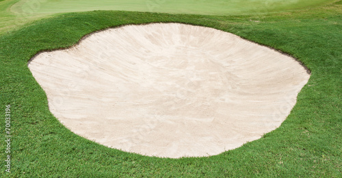 The big sand bunker on the beautiful golf course