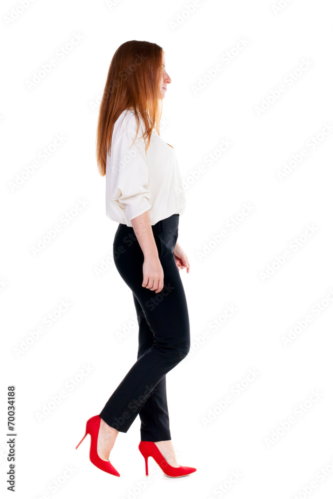 walking redhead business woman. walking redhead business woman.