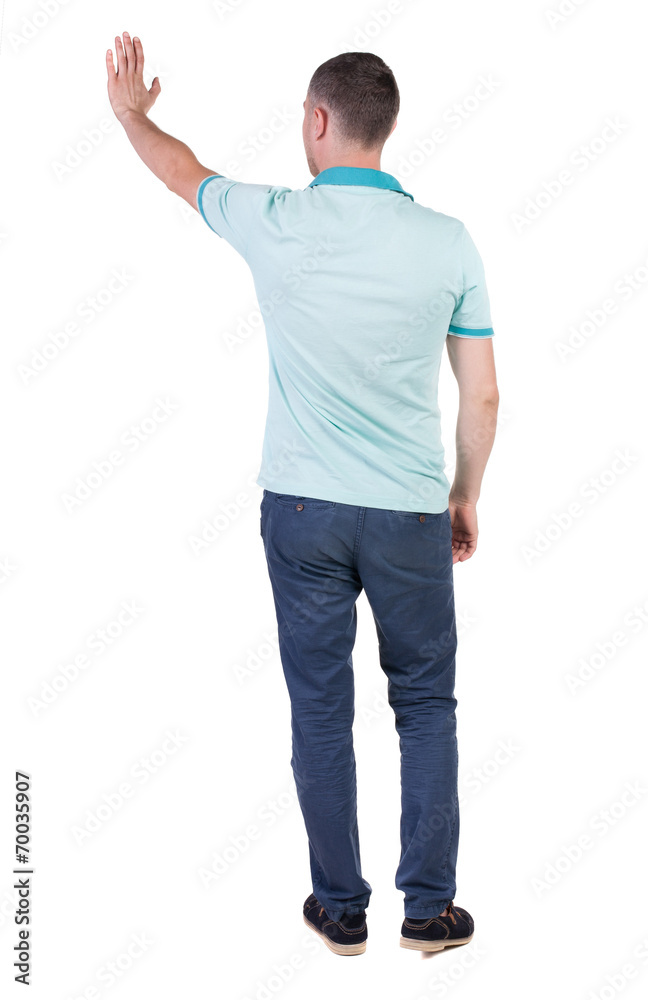 Back side view of man in shirt handshake. Back side view of man in shirt handshake.