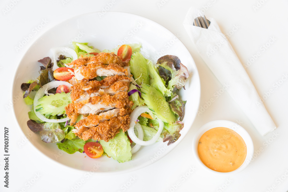 Fried Chicken salad with tomatoes, Cucumber and Onion. Fried Chicken salad with tomatoes, Cucumber and Onion.