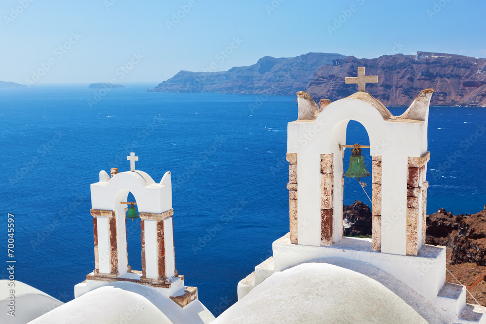 Fototapeta premium Oia town on Santorini island, Greece. Caldera on Aegean sea.