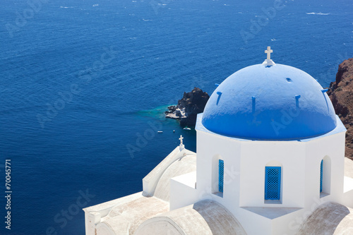 Oia, Santorini island, Greece. White church with blue dome