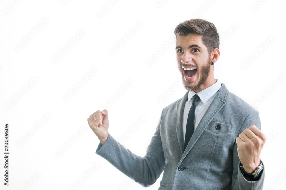 Happy successful business man celebrating victory isolated Happy successful business man celebrating victory isolated