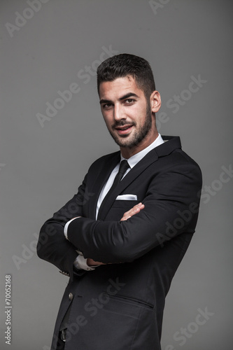 Fotografie handsome elegant man on grey background