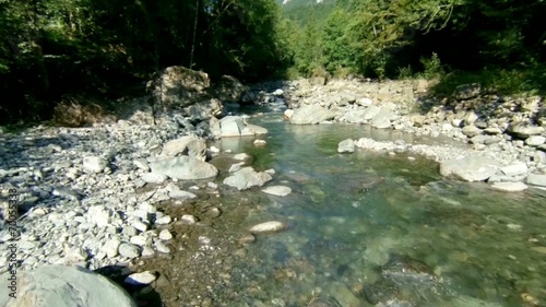 flying over mountain river in summer