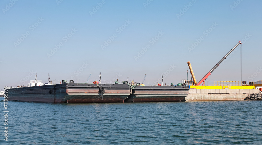 Loading of two cargo barges in Burgas port