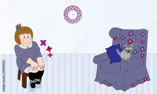 Niña sentada y sillón con gato.