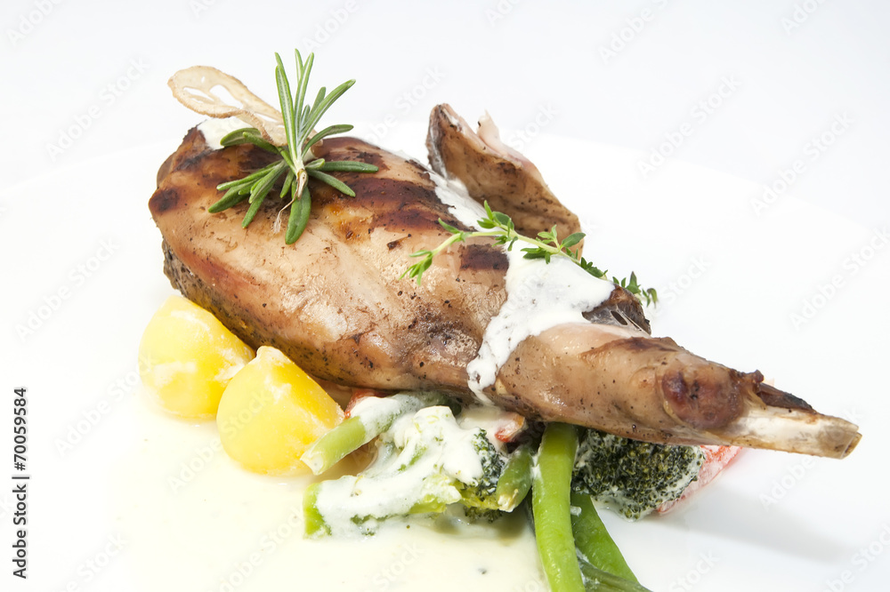 roasted rabbit meat and potatoes with vegetables roasted rabbit meat and potatoes with vegetables