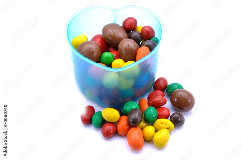 Various Color Of Chocolate Beans In Plastic Container Various Color Of Chocolate Beans In Plastic Container