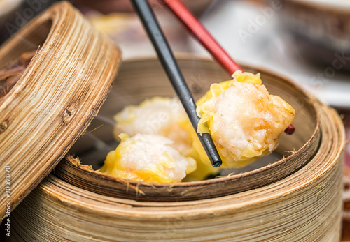 Obraz na płótnie Dim Sum in Bamboo Steamed Bowl