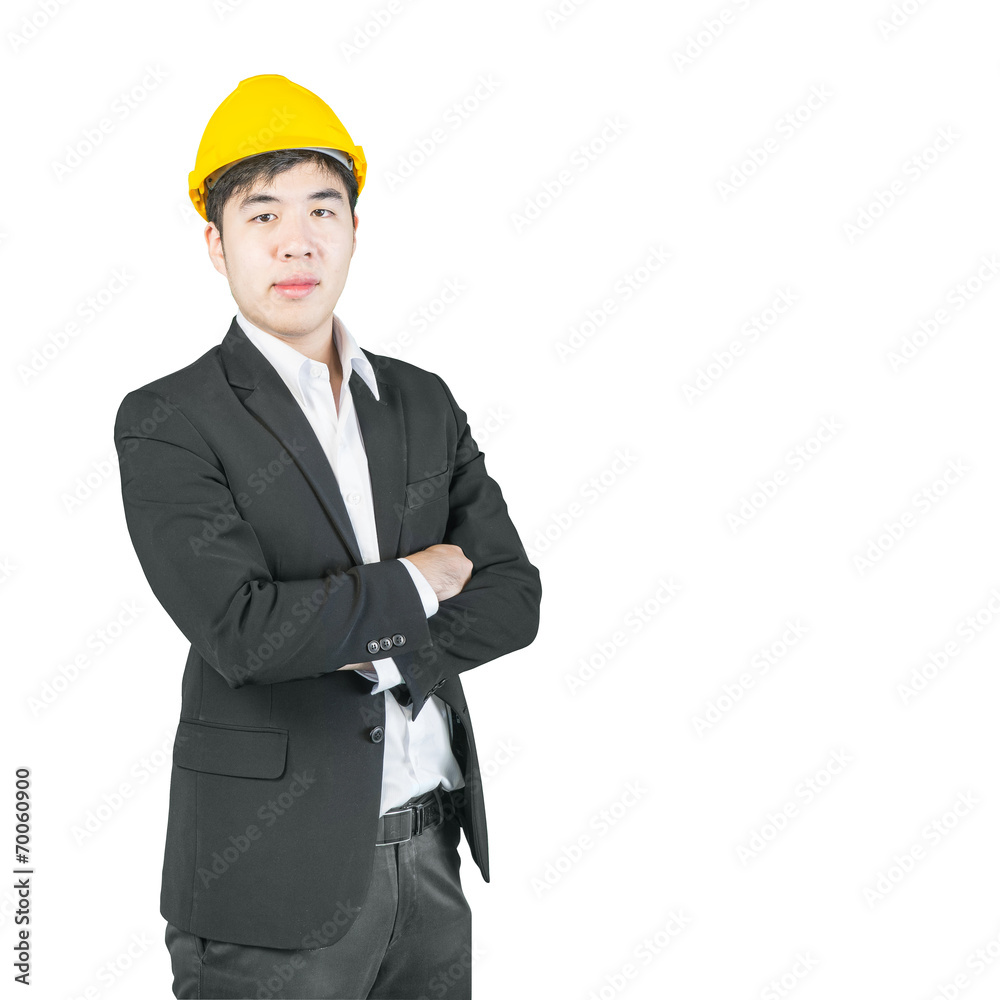 Asian engineer with drawings standing isolated on white backgrou Asian engineer with drawings standing isolated on white backgrou