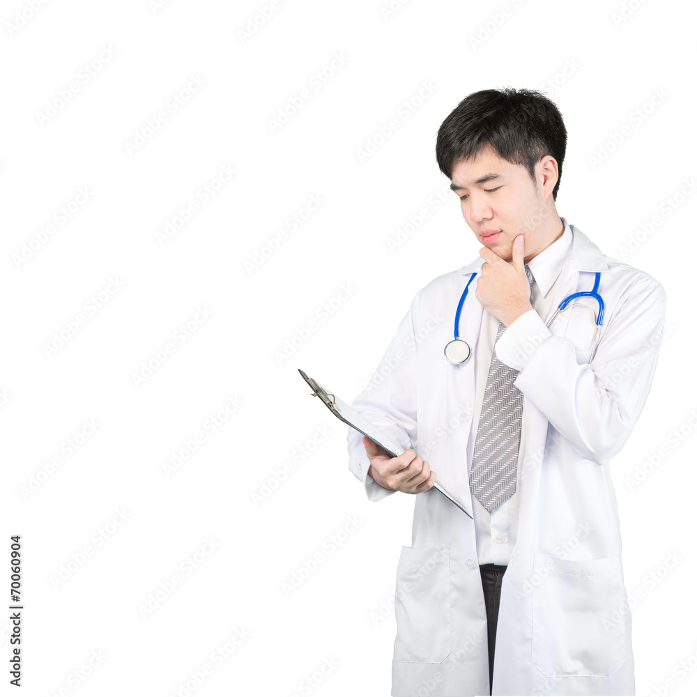 Handsome Asian doctor studies medical report.Isolated on white b Handsome Asian doctor studies medical report.Isolated on white b