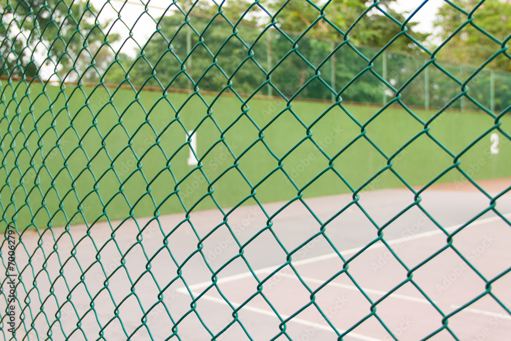 Fototapeta premium Wire fence at tennis court