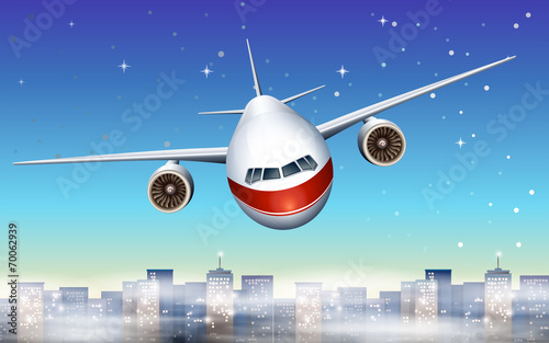 An airplane above the city