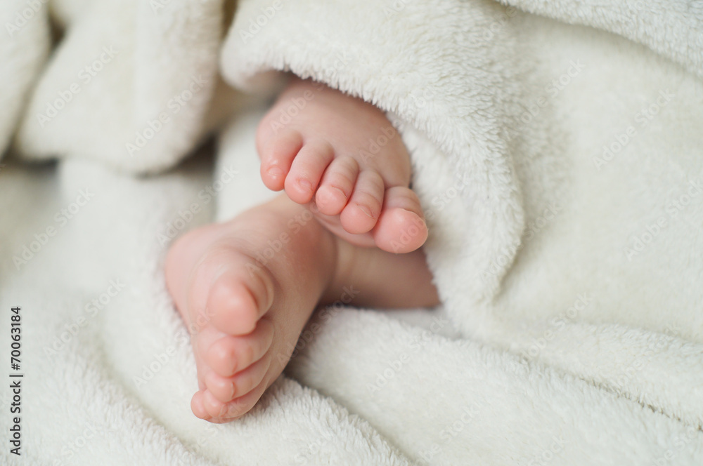 Baby Feet under blanket