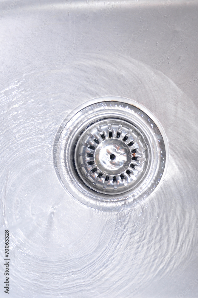 Water Flowing Down In The Hole In A Kitchen Sink Water Flowing Down In The Hole In A Kitchen Sink