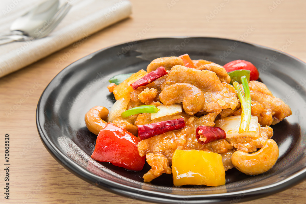 Stir fired chicken with cashew nuts, Thai food style Stir fired chicken with cashew nuts, Thai food style
