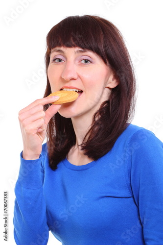 Smiling woman with fresh cake