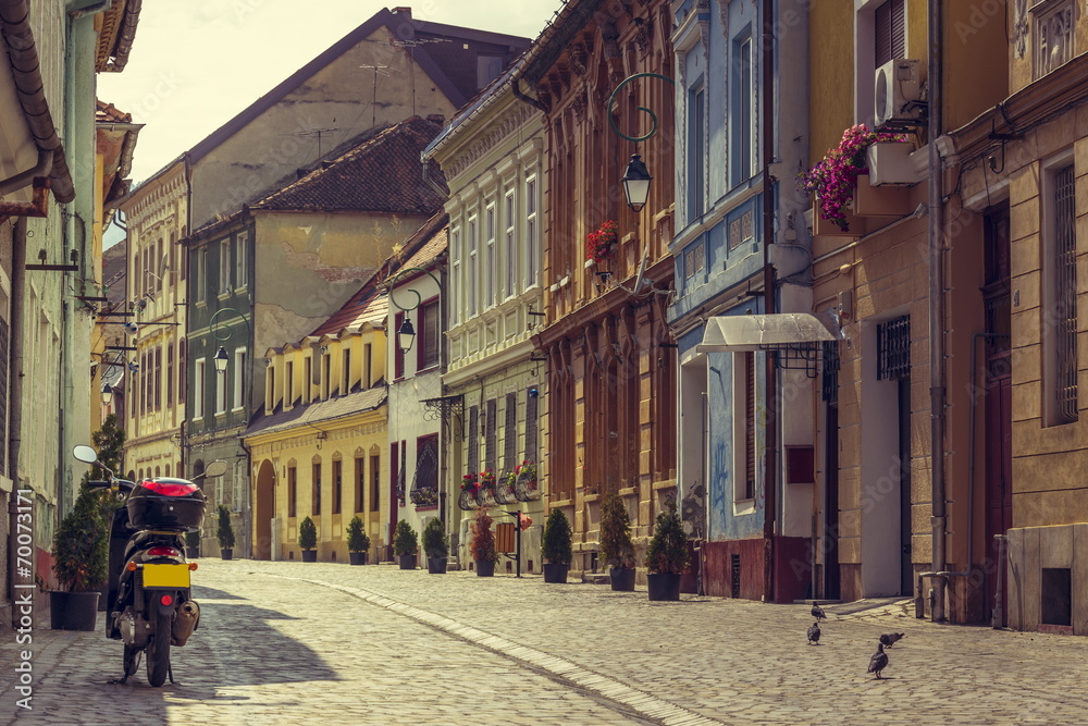 Scooter parked on alley in Brasov city, Romania