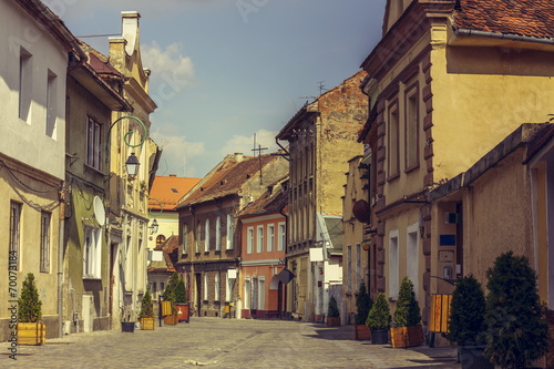 Medieval houses and promenade alley in Brasov city  Romania
