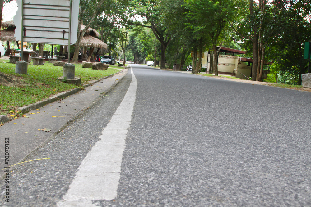 Asphalt road texture with left white stripe Asphalt road texture with left white stripe