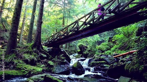 young woman hiking in the forest