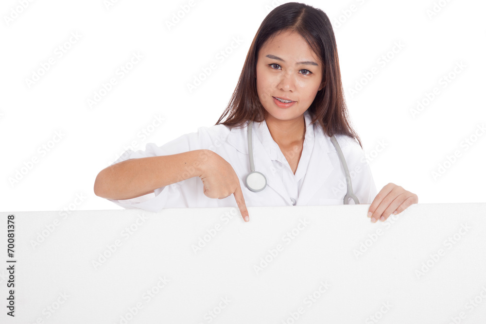 Young Asian female doctor point down to blank sign Young Asian female doctor point down to blank sign