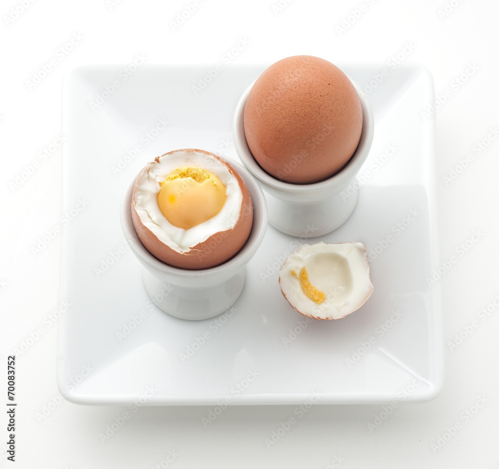 Boiled eggs on white plate, isolated on white Boiled eggs on white plate, isolated on white