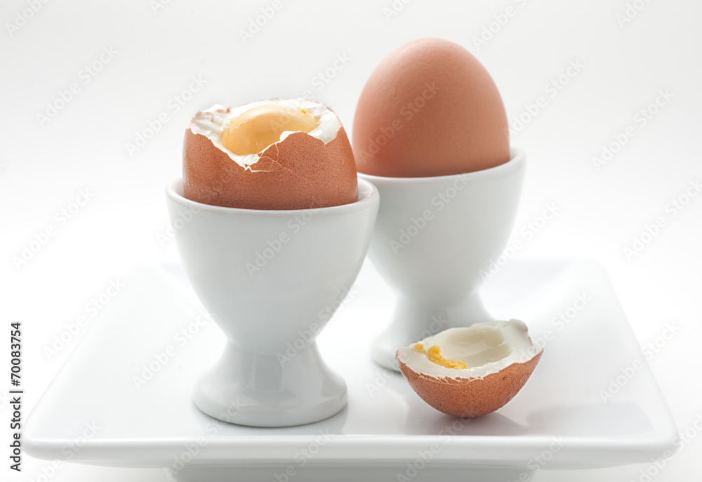 Boiled eggs on white plate, isolated on white Boiled eggs on white plate, isolated on white
