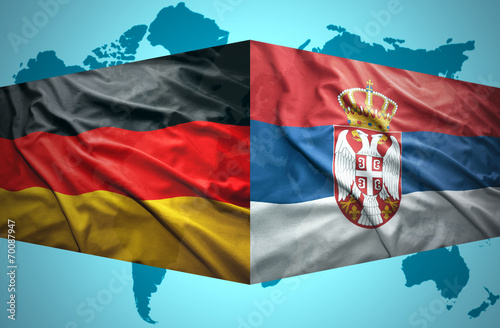 Waving Serbian and German flags