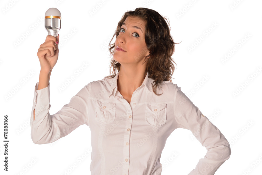 Womanl holds in her hand new generation of light bulb