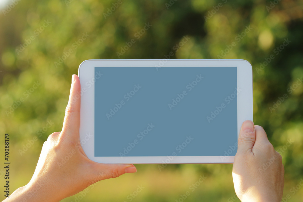 digital tablet pc in nature
