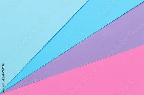 bluish construction paper sheets arranged diagonally