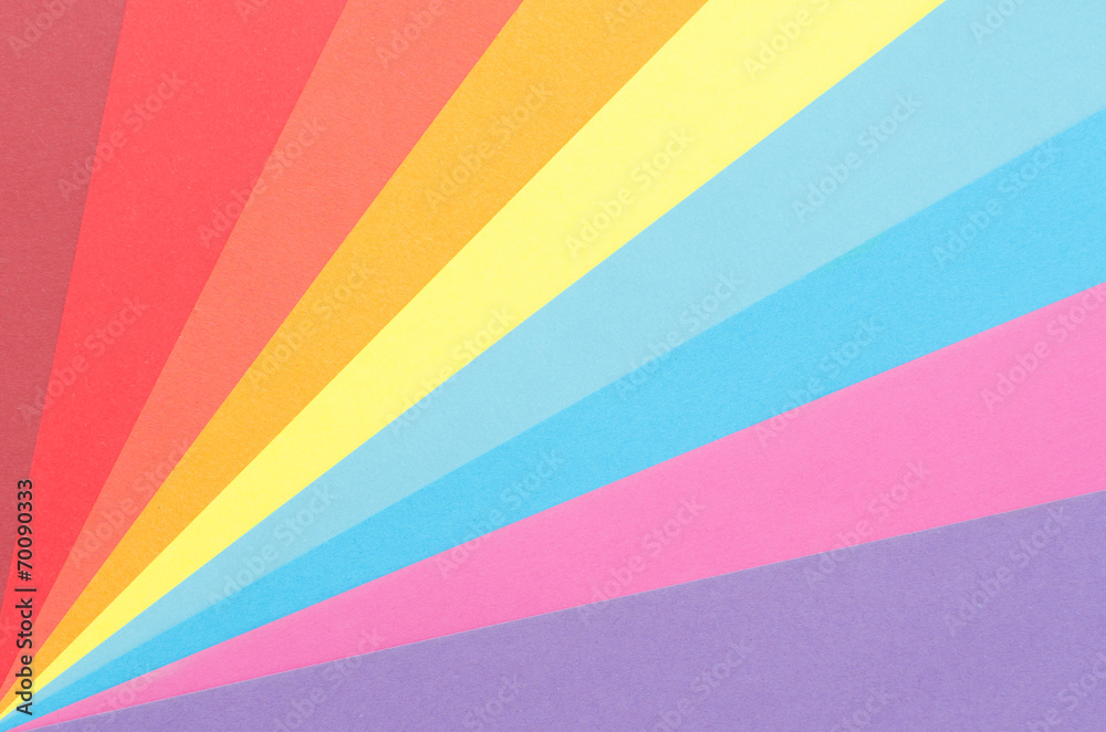 colorful construction paper arranged as diagonal rays colorful construction paper arranged as diagonal rays