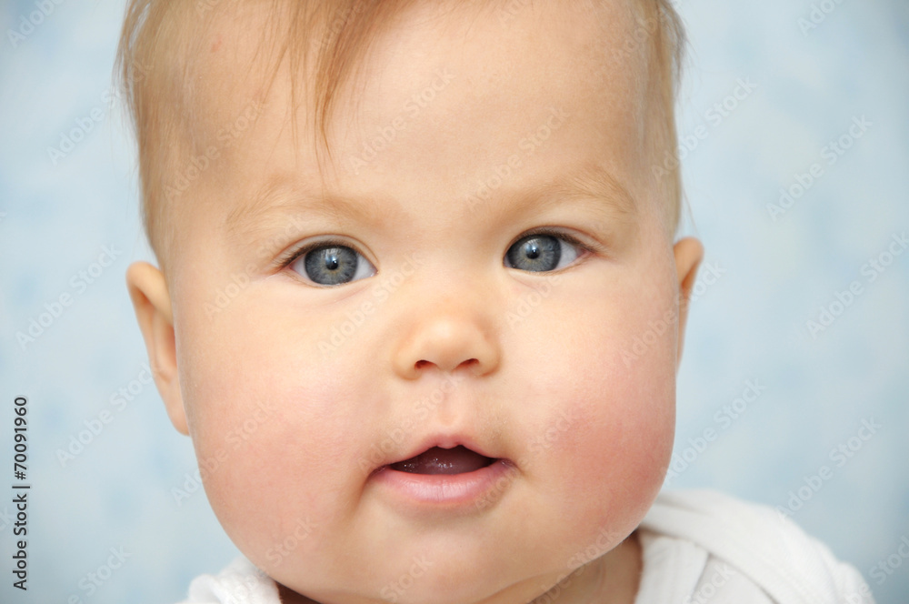 Adorable Baby child with chubby cheeks portrait Adorable Baby child with chubby cheeks portrait