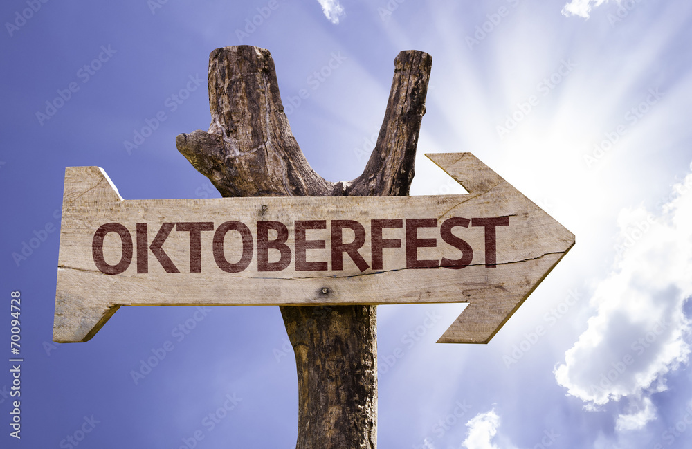 Oktoberfest wooden sign on a beautiful day