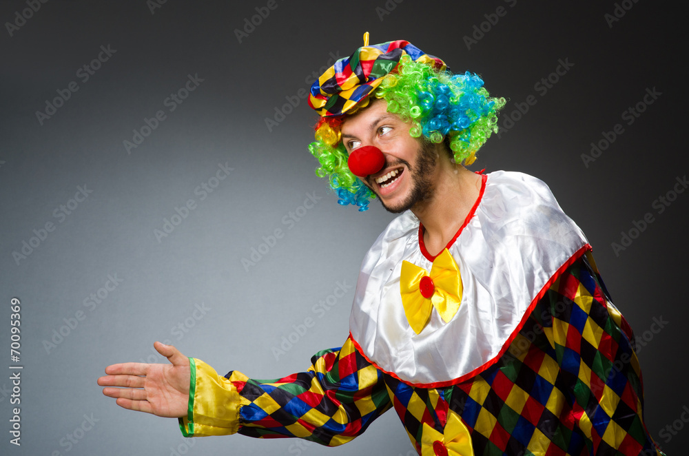 Funny clown in colourful costume Funny clown in colourful costume