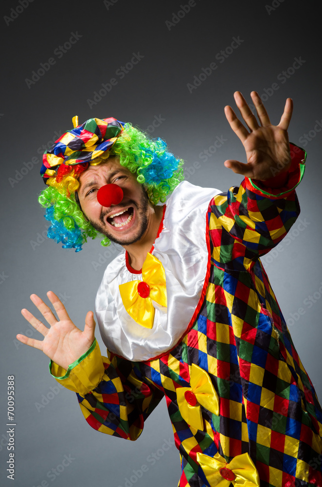 Funny clown in colourful costume Funny clown in colourful costume