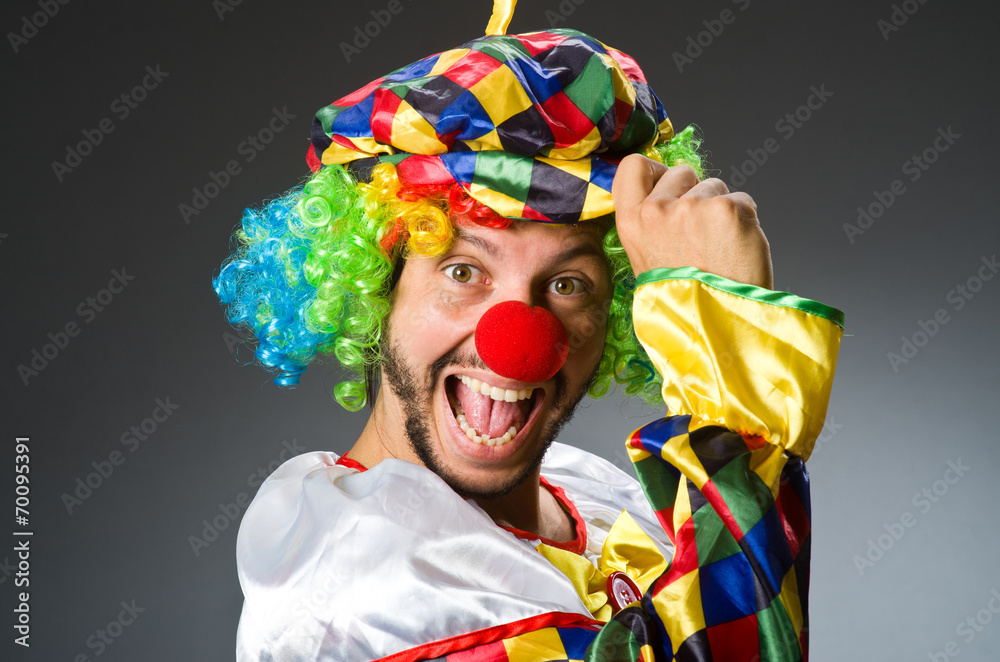 Funny clown in colourful costume Funny clown in colourful costume