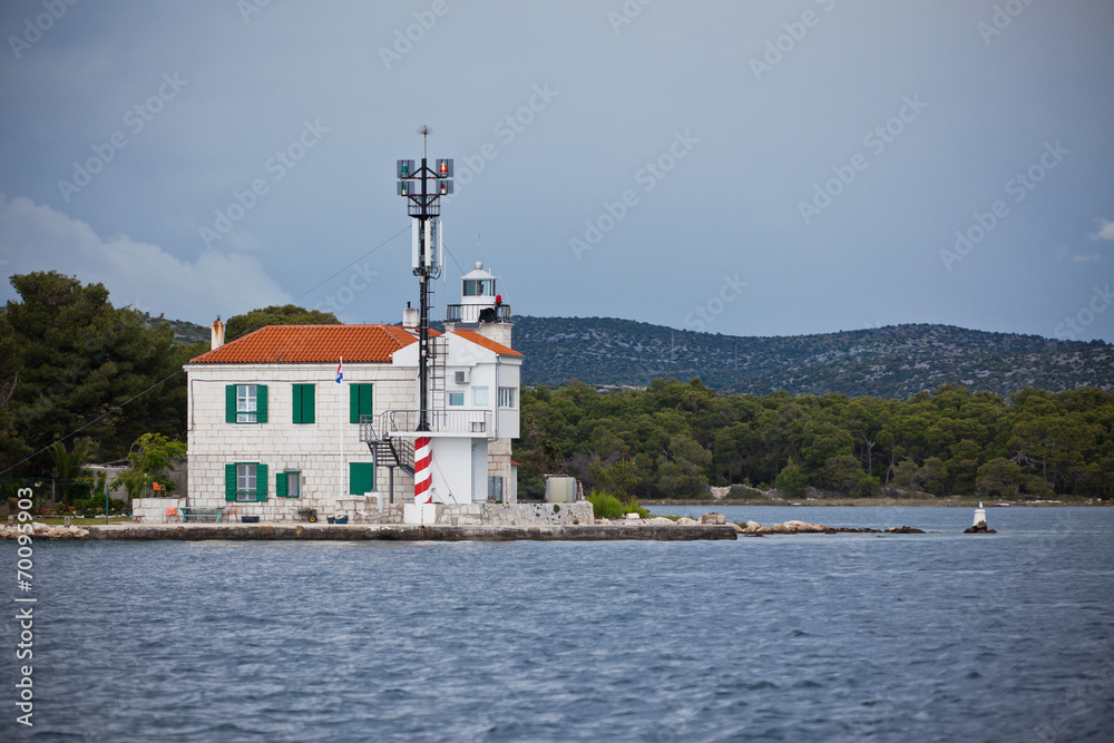 Small lighthouse in a Sibenik bay entrance, Croatia