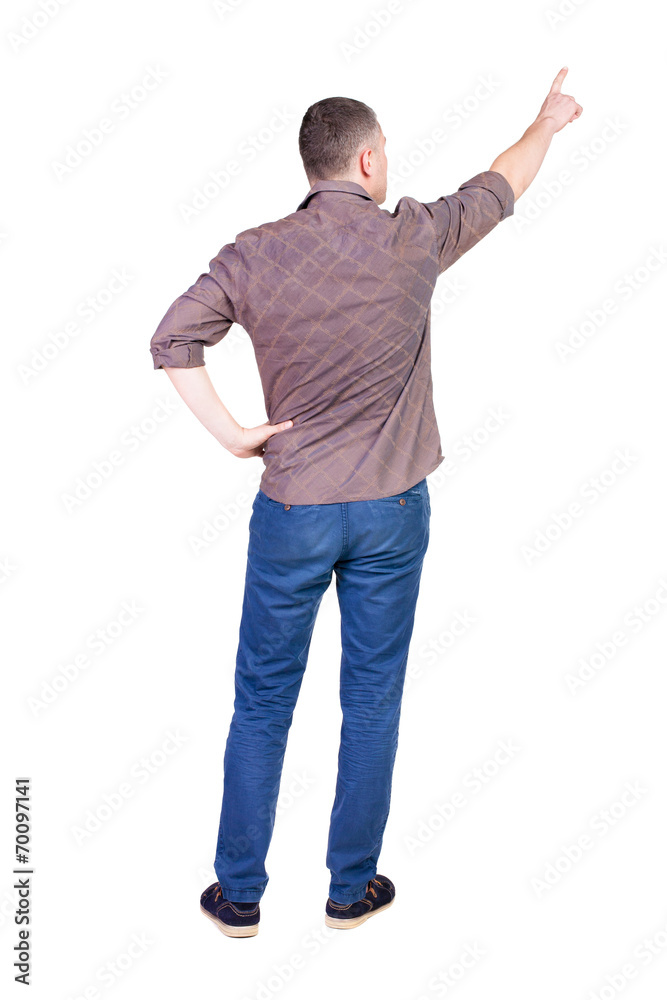 Back view of pointing young men in shirt and jeans. Back view of pointing young men in shirt and jeans.