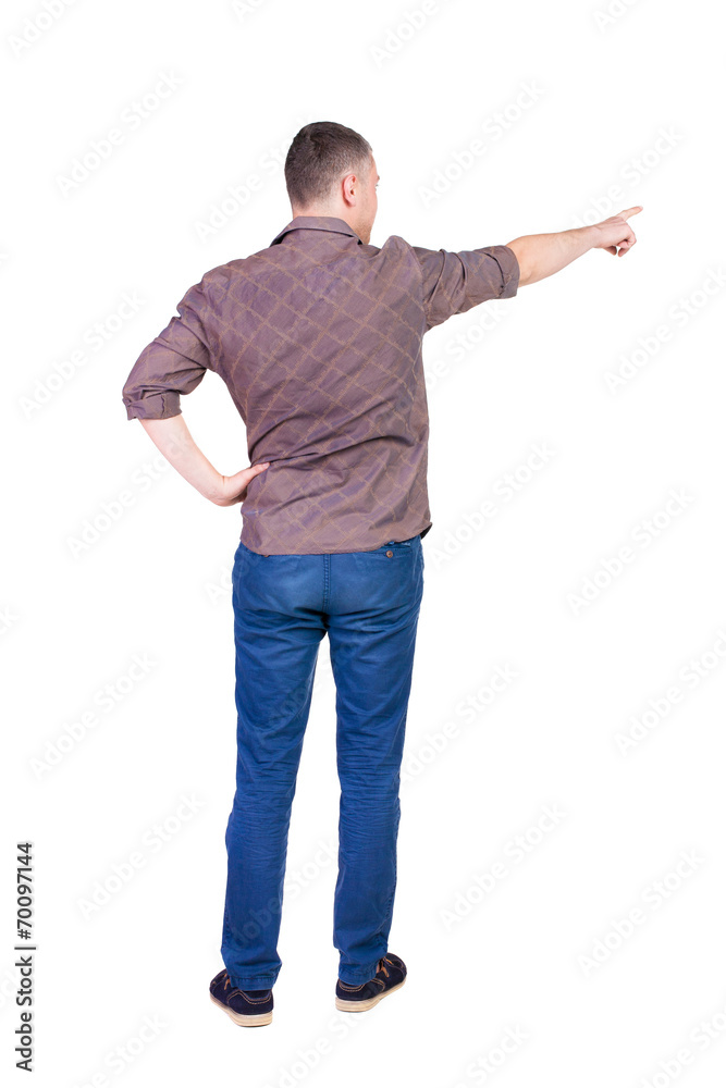 Back view of pointing young men in shirt and jeans. Back view of pointing young men in shirt and jeans.
