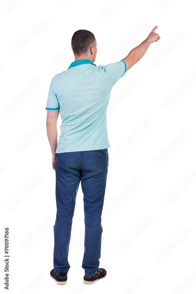 Back view of pointing young men in shirt and jeans. Back view of pointing young men in shirt and jeans.